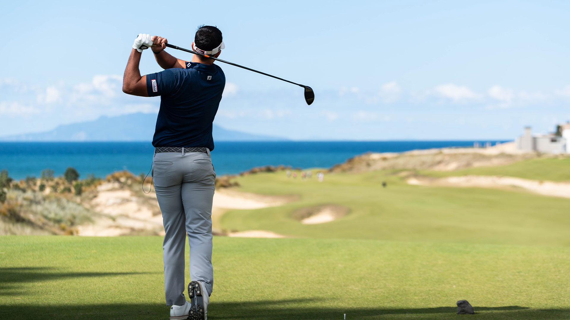 Man playing golf